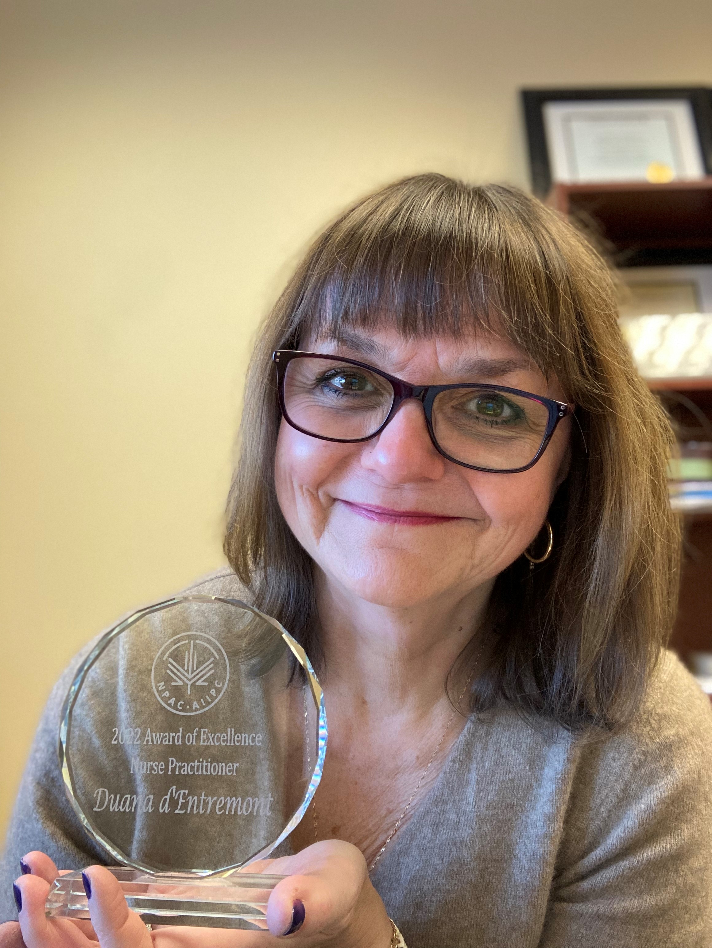Duana d'Entremont holds her award