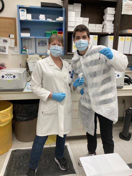 Two co-op students in a research lab