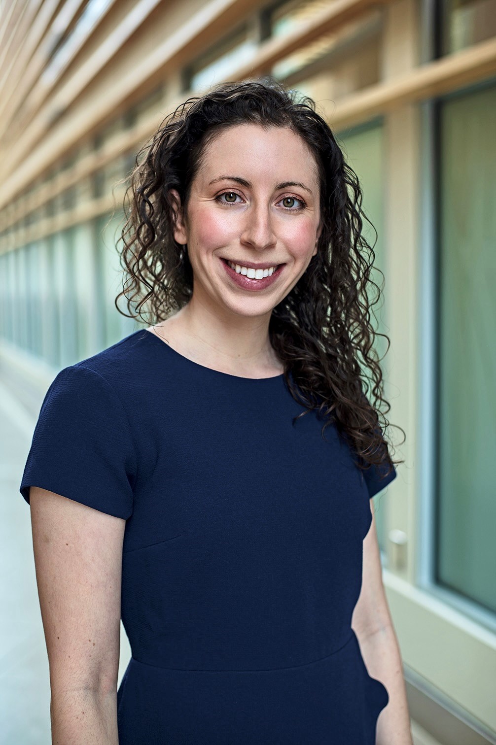 A photo of a smiling Dr. Aleza Yakubovich