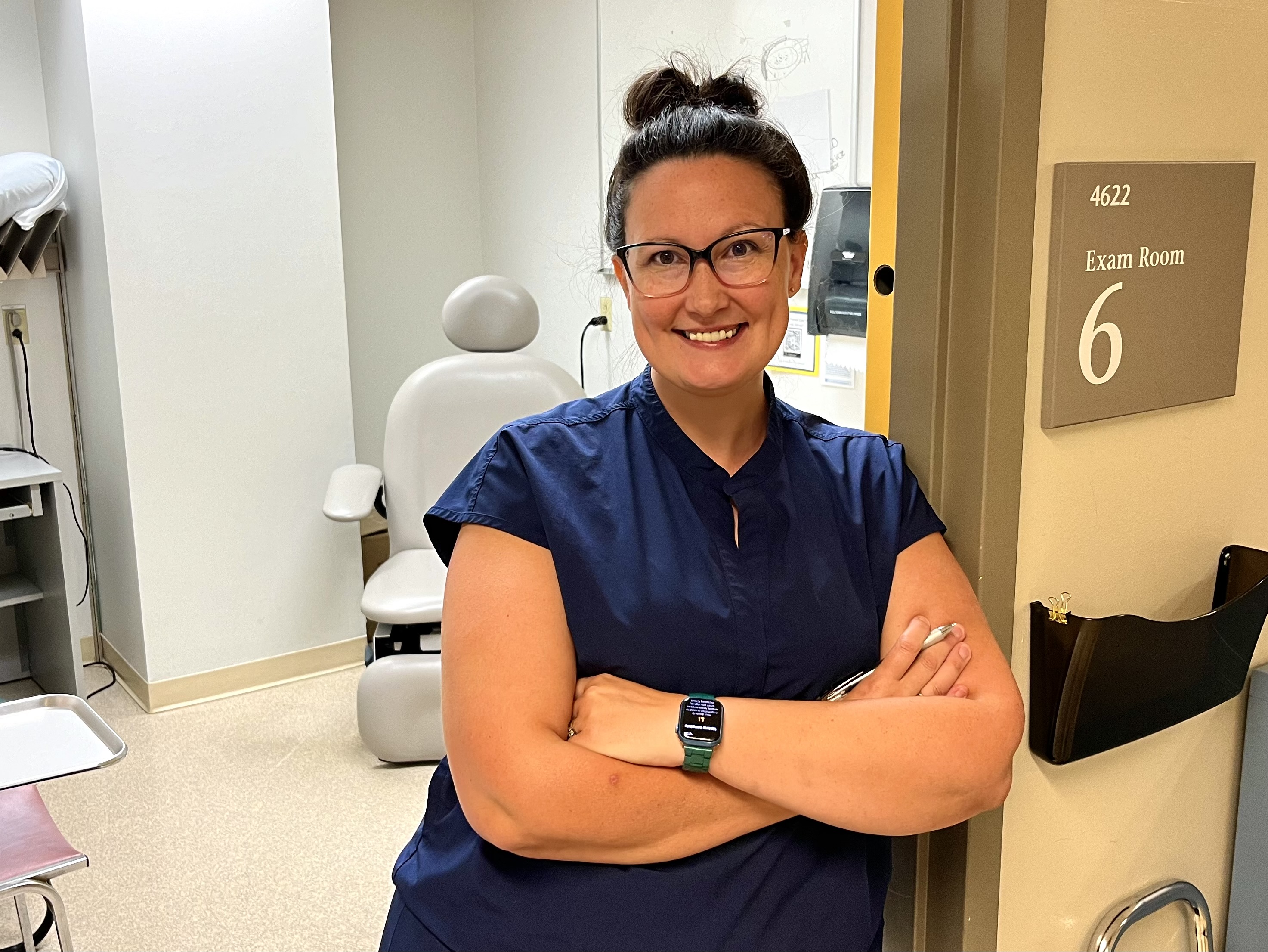 Clinical nurse specialist Lindsay Burke leans against the door of an office in the Multi-Disciplinary Leg Ulcer Clinic at Halifax’s QEII Health Science's Centre.