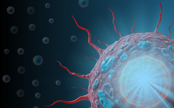 A graphic visualization of a cancer cell being treated with beams of light blue radiation. 