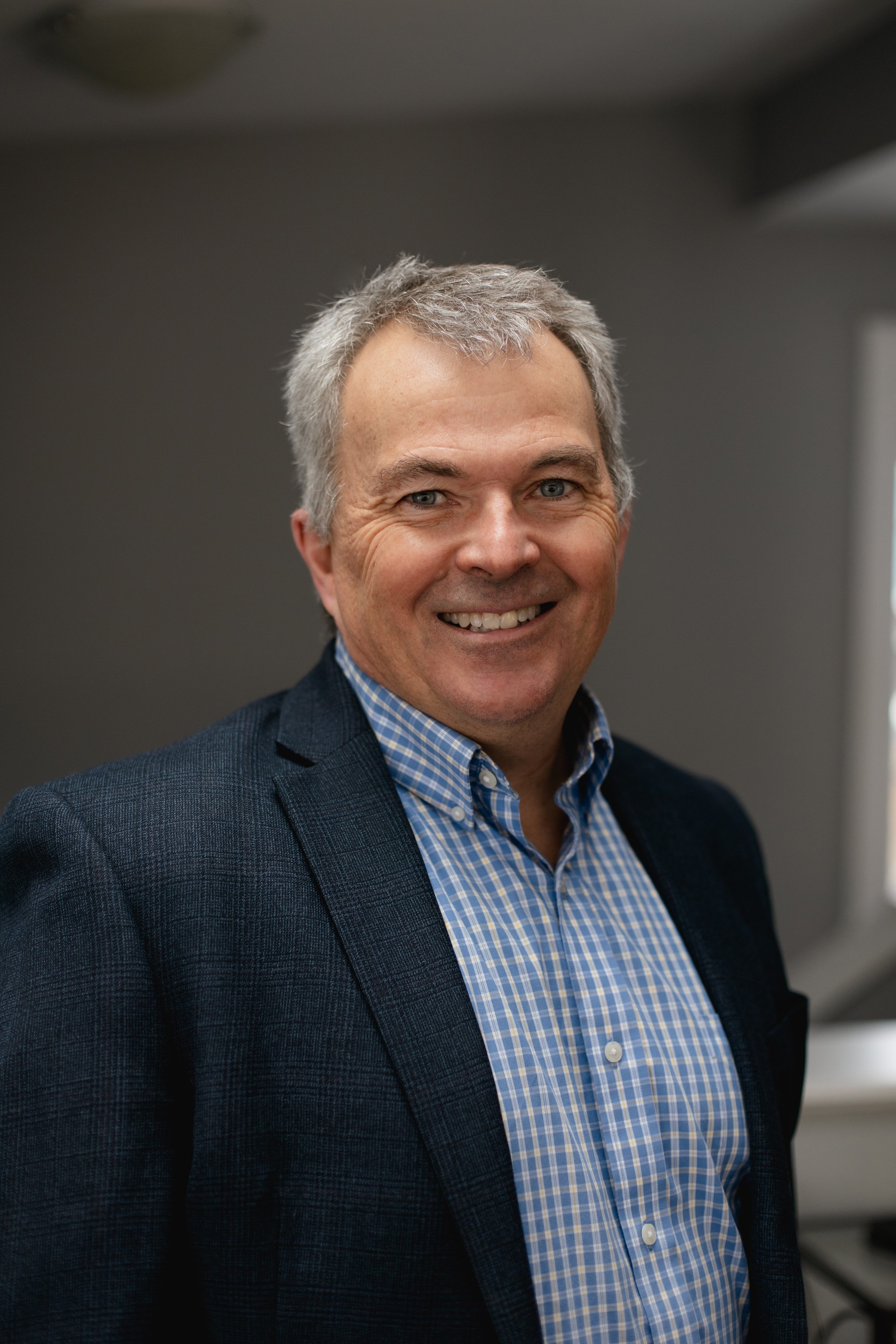 A headshot of Dr. MacDonald