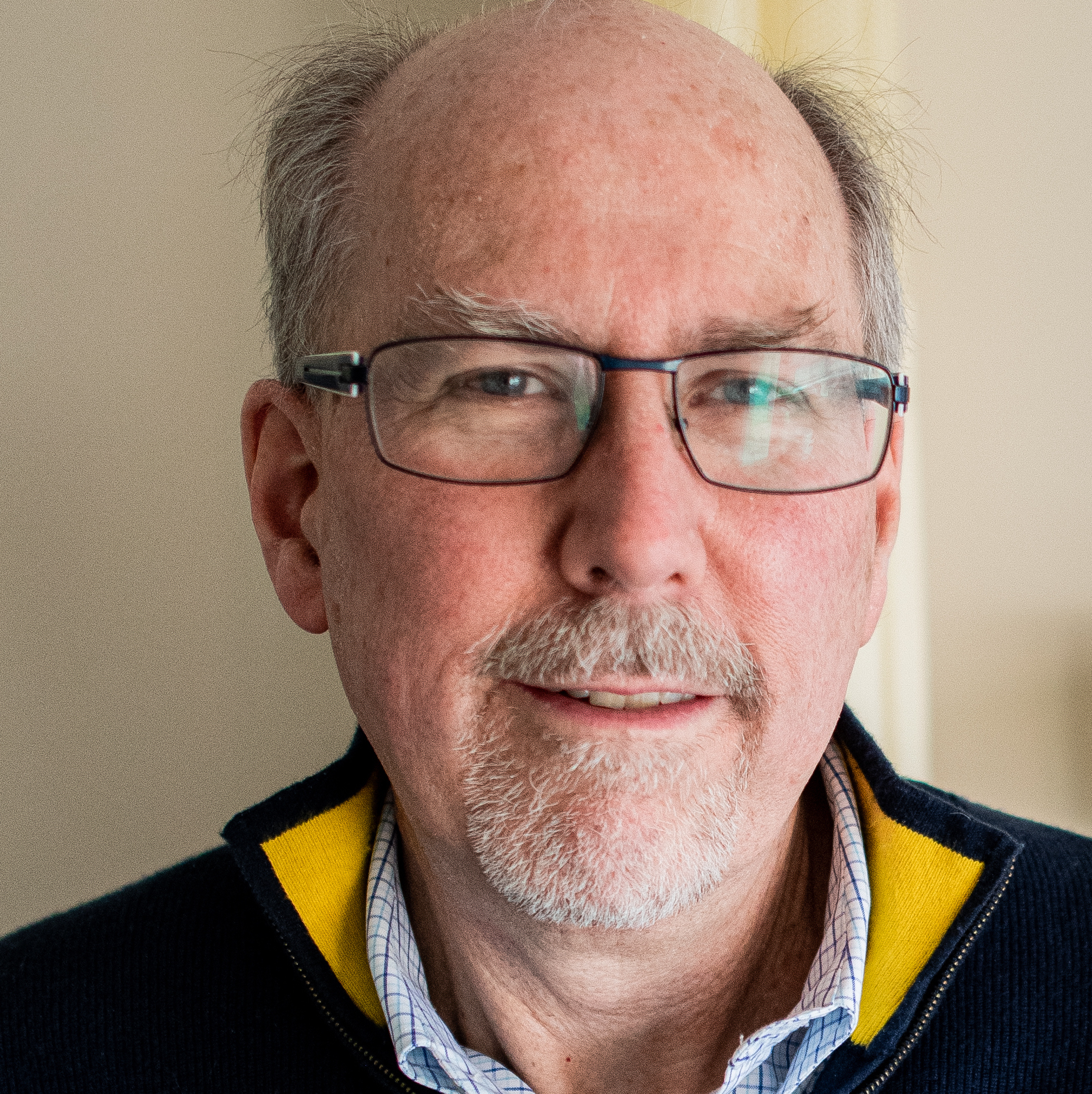 A headshot of Dr. Michael West.