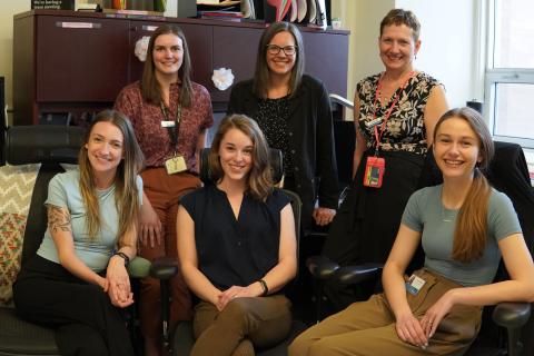 Members of the Atlantic Clinical Cancer Research Unit smile in their office at the Centre for Clinical Research.