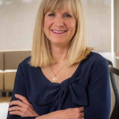 A picture of Gail Tomblin Murphy in a boardroom 
