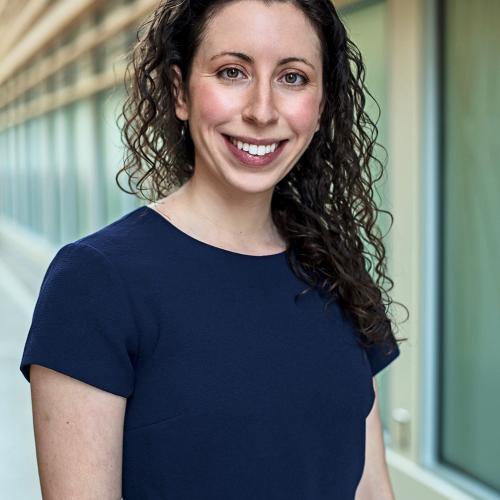 A photo of a smiling Dr. Aleza Yakubovich